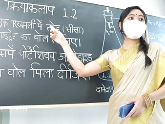 Saanvi Bahl instructs her Indian schoolgirl Cherry Lecturer how to plumb her fuckbox with her hefty boobies