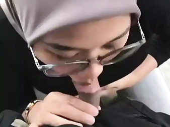 Malaysian honey Awek Tudung takes on her boy's rigid spear in a red-hot rear end-fashion sesh